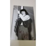 POP MUSIC, Rolling Stones, signed photo by Bill Whyman, three-quarter length holding guitar, 5.5 x