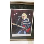POP MUSIC, colour print showing Kurt Cobain, half-length performing in striped jumper, signed by the