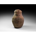 Neolithic Textured Greyware Jar with Human Face