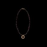 Garnet and Gold Bead Necklace with Gold Pendant
