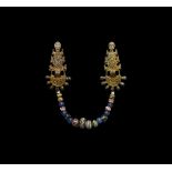 Merovingian Gilt Radiate-Headed Brooch Set with Beads