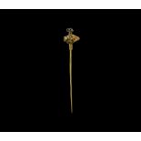 Fatimid Bird-Headed Gold Pin with Garnet
