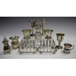 A collection of assorted 20th century silver items, comprising a pair of four-division toast