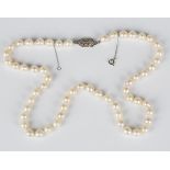 A single row necklace of cultured pearls, length 47.5cm, and a group of silver and other jewellery.