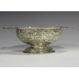 A 19th century Continental silver oval bowl, the body decorated in relief with a band of flowers and