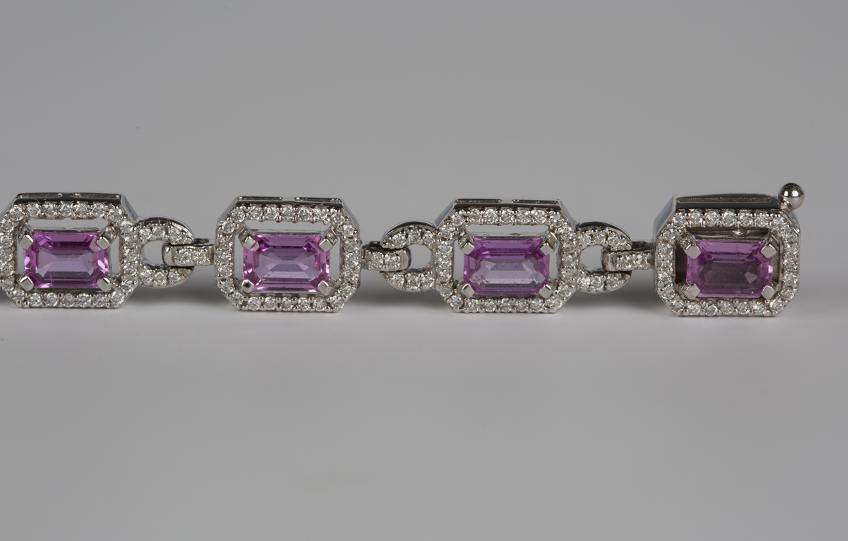 An 18ct white gold, pink sapphire and diamond bracelet, each canted corner rectangular link claw set - Image 3 of 5