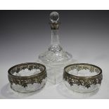 A pair of Continental silver mounted cut glass circular bowls, pierced with trailing vines, diameter