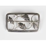 A Georg Jensen sterling silver brooch, designed by Georg Jensen, of rectangular form with a