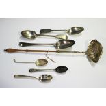 A small group of silver cutlery, including a George III Hanoverian pattern tablespoon, London