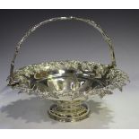 A Victorian plated fruit basket, embossed with fruit and flowers within a cast foliate rim, diameter