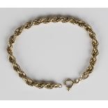 A 9ct gold ropetwist link bracelet on a boltring clasp, weight 5.1g, length 21cm.Buyer’s Premium