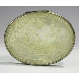 A mid to late 18th century silver mounted mother-of-pearl oval snuff box, the hinged lid carved in
