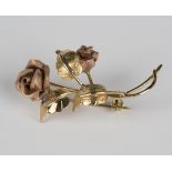 A 14ct two colour gold brooch, designed as a rose spray, import mark Birmingham 1968, weight 4.7g,