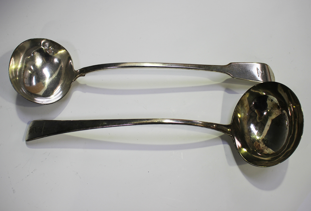 A George III silver Old English pattern soup ladle, London 1790, length 35cm, and a George IV silver