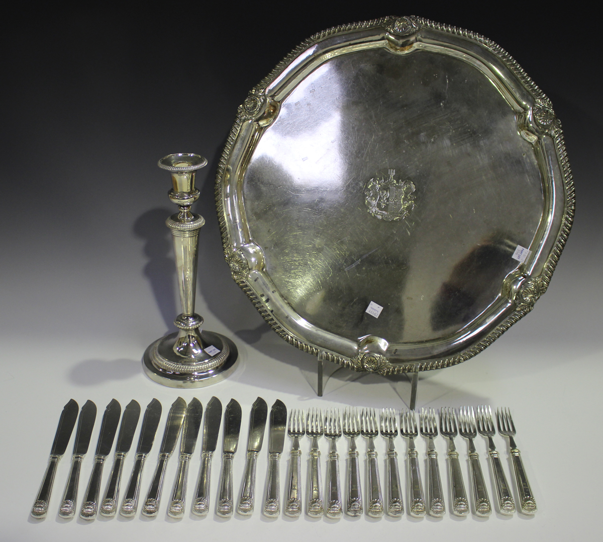 A large 19th century Sheffield plate salver with gadrooned and scallop shell border, the centre