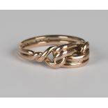 A 9ct gold ring in a knotted design, weight 3.7g, ring size approx N.Buyer’s Premium 29.4% (