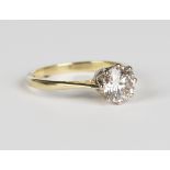 An 18ct gold and diamond single stone ring, claw set with a circular cut diamond, weight 3g, ring