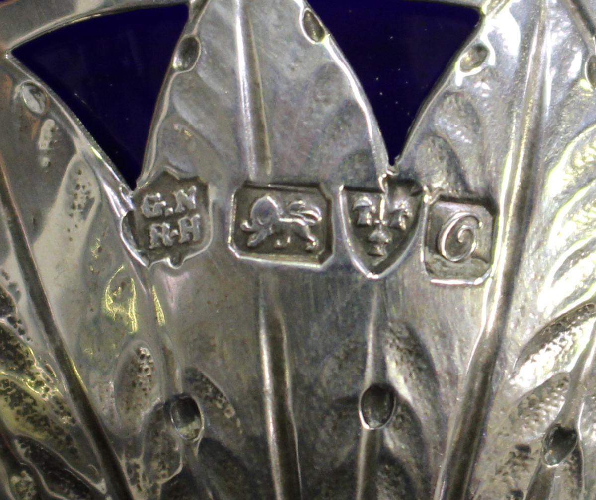 A George V silver sugar basket with pieced scrollwork decoration, the ovoid body with ram's mask and - Image 2 of 2