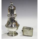 An Elizabeth II silver baluster sugar caster with pierced dome cover and Celtic bands, Sheffield