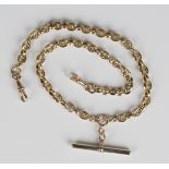 A 9ct gold faceted fancy and faceted plain oval link watch Albert chain, fitted with two swivels and