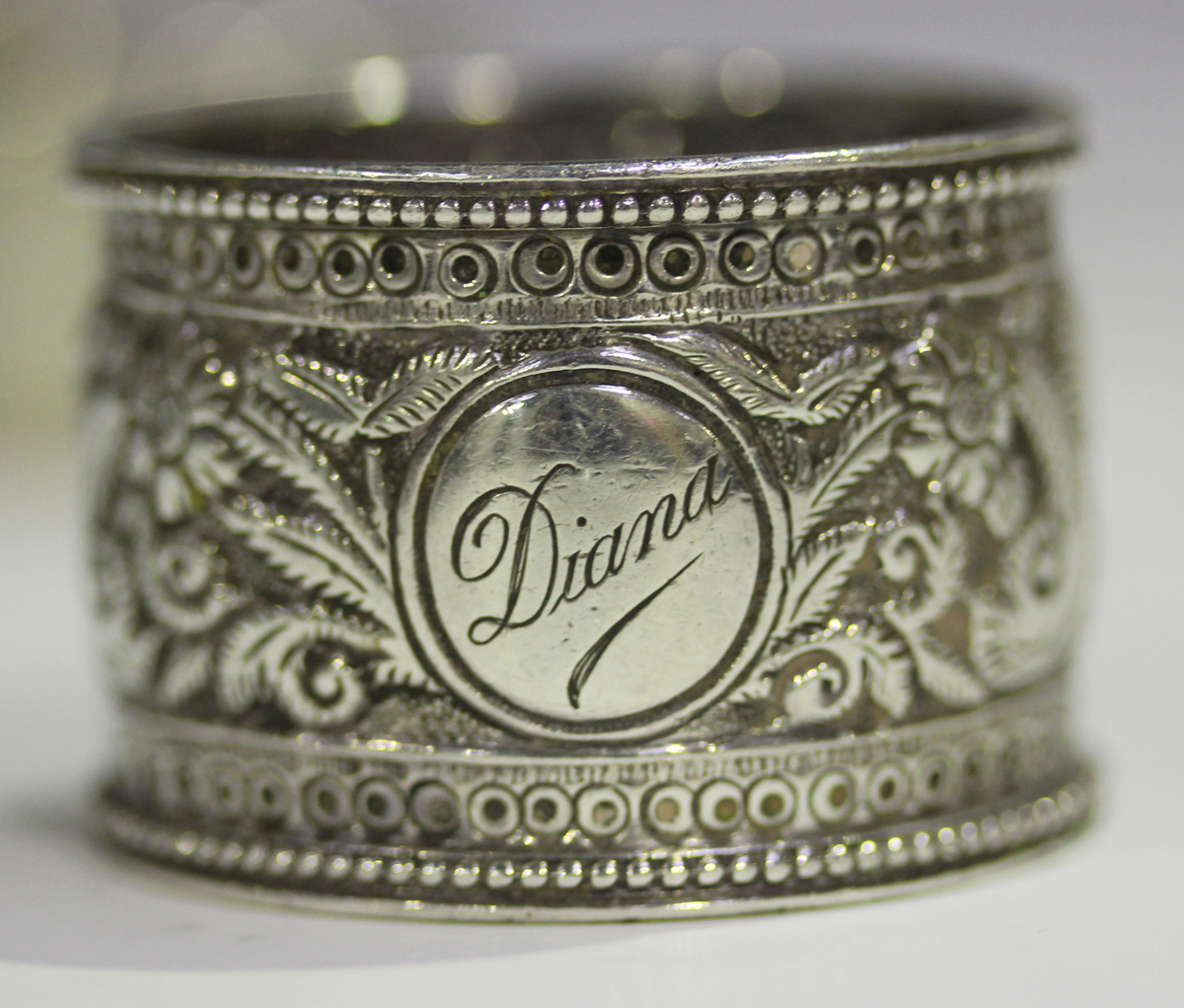 A pair of Edwardian silver napkin rings with beaded rims, Sheffield 1904 by Atkin Brothers, together - Image 3 of 3