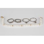 A single row bracelet of freshwater cultured pearls on a gold clasp, detailed '375', length 18cm,