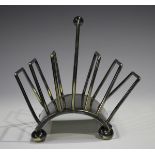 A Hukin & Heath plated six-division toast rack, possibly designed by Dr Christopher Dresser, the