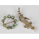 A gold and seed pearl brooch, designed as a floral and foliate spray, detailed '9ct', width 5.3cm,