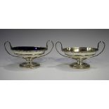 A pair of George IV silver oval two-handled salts with beaded bands, London 1828 by William Eley II,