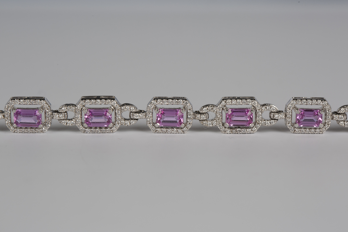 An 18ct white gold, pink sapphire and diamond bracelet, each canted corner rectangular link claw set - Image 4 of 5