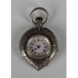 A silver heart shape cased keyless wind open-faced lady's fob watch with unsigned gilt jewelled