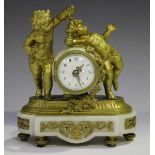 A late 19th century French cast ormolu and white marble mantel timepiece, the movement with platform