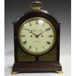 A George III mahogany bracket clock with eight day twin fusee movement striking hours on a bell, the