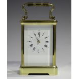 A 20th century French lacquered brass carriage timepiece by L'Epée, with jewelled eight day