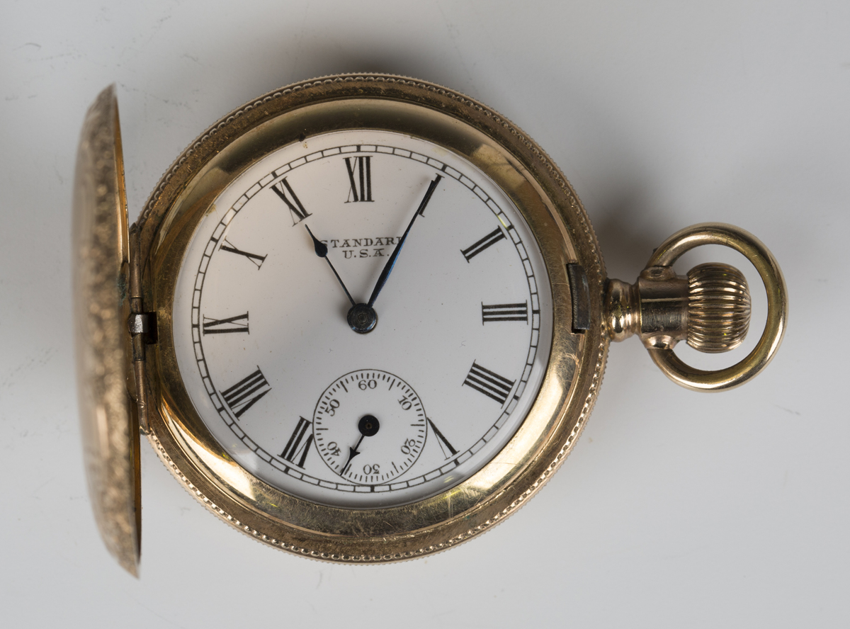 A Standard USA gilt metal keyless wind hunting cased fob watch, the gilt lever movement detailed '