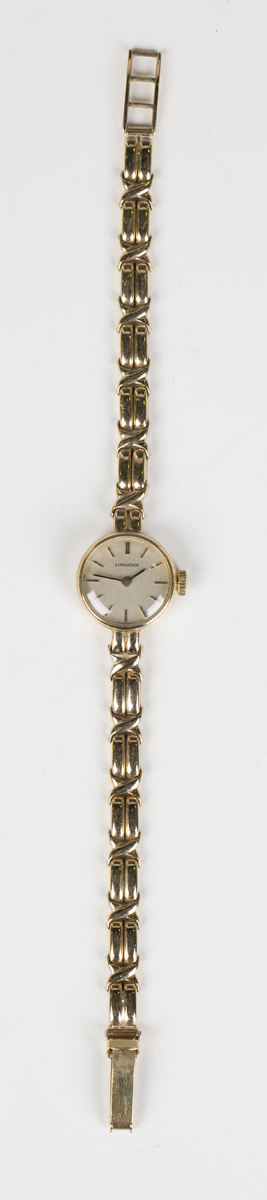 A Longines 9ct gold lady's bracelet wristwatch, the signed silvered dial with baton hour markers and - Image 6 of 7