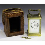 A late 19th/early 20th century French brass cased carriage clock with eight day movement,