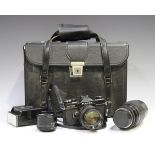 A Fujica ST 705 camera with Tamron 1.2:5 f=105mm lens, together with a Sigma Zoom 1:4.5-56 f=75-