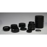 A Leitz Wetzlar Leica Summicron-R 1:2/50 lens, No. 2257215, together with four Leica lens hoods,