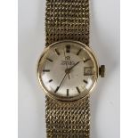 An Omega Automatic 9ct gold lady's bracelet wristwatch, the signed silvered dial with baton hour