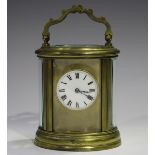 An early 20th century French lacquered brass cased carriage timepiece with eight day movement and