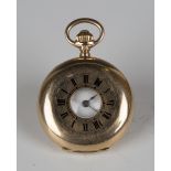 A gold keyless wind half-hunting cased lady's small-size fob watch with unsigned jewelled cylinder