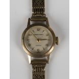 An Ernest Borel 9ct gold lady's bracelet wristwatch, the signed dial with alternating gilt Arabic