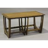 A mid-20th century G-Plan teak nest of three occasional tables, height 51cm, width 99cm, depth