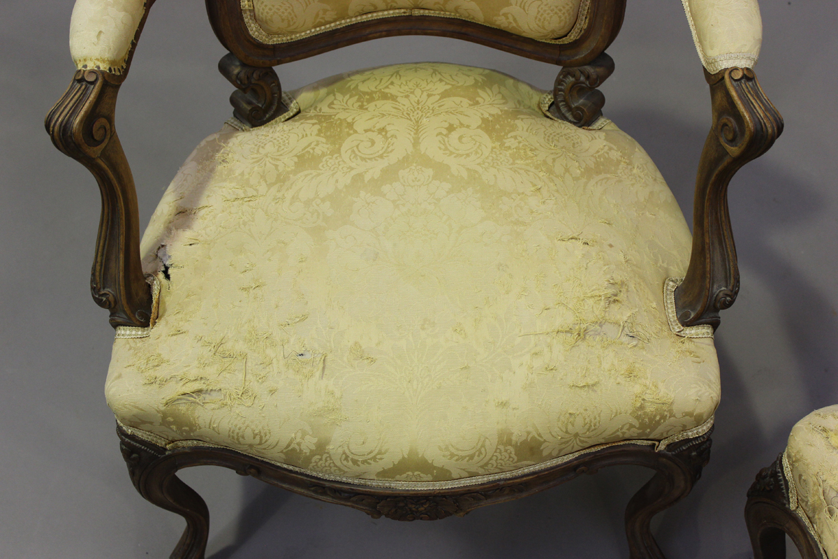 A late 19th century French Louis XV style walnut showframe salon suite, comprising a settee, - Image 7 of 12