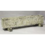 A large 20th century cast composition stone rectangular garden planter, one side moulded with bull