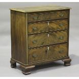 A 19th century and later mahogany chest of four graduated long drawers, on ogee bracket feet, height