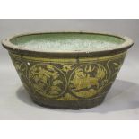 A large 19th century Chinese glazed stoneware oval bath or planter, the sides decorated with