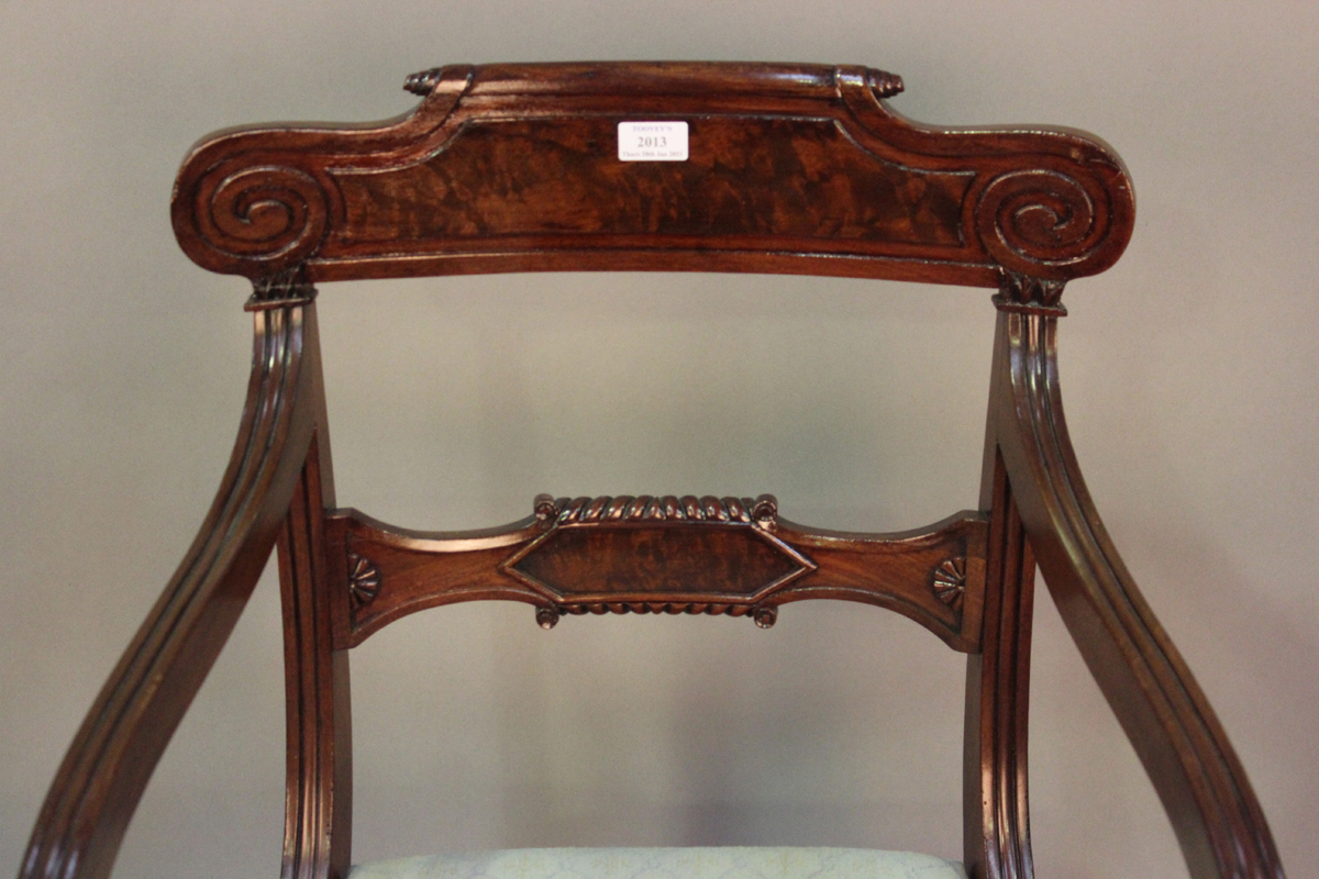 A set of eight Regency figured mahogany bar back dining chairs with carved scroll decoration and - Image 4 of 8