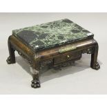 An early 20th century Continental Chinese style carved and stained softwood low table, in the manner